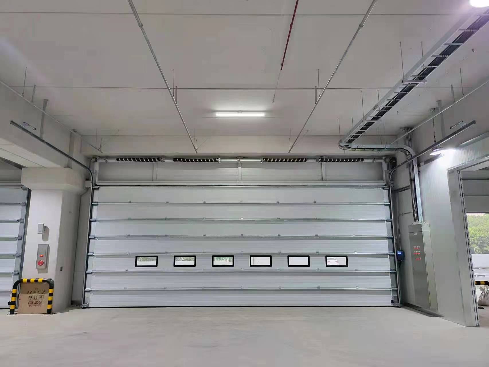 Varför kan en takskjutport lösa mer än bara åtkomstproblem?